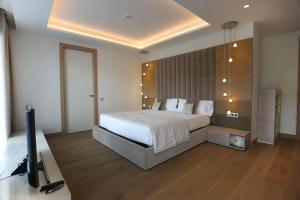 Ein Bett oder Betten in einem Zimmer der Unterkunft Cosmo Apartments Platja d'Aro