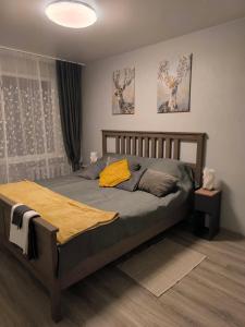 Ένα ή περισσότερα κρεβάτια σε δωμάτιο στο Ludza stay Apartment