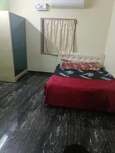 Postel nebo postele na pokoji v ubytování IFA Homes Pondy