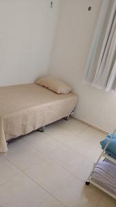 En eller flere senge i et værelse på COP 30 - apartamento 2 quartos, sala e cozinha