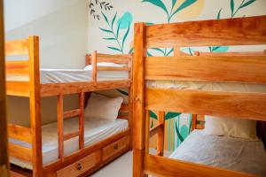 a bunk bed room with two bunk beds at Eco Hotel Mãe De Sagui in Castanhal