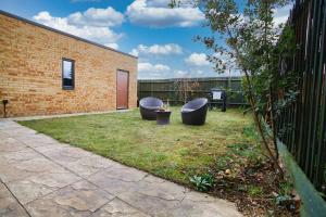 Κήπος έξω από το Milton Keynes new 5-Bedrooms 11guests Contractor family holiday Free Parking