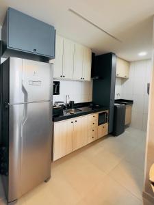 Η κουζίνα ή μικρή κουζίνα στο Smart Stay Izidro - 1304 - Ponta Verde