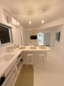 Η κουζίνα ή μικρή κουζίνα στο AKRÓPOLl Prainha