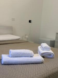 En eller flere senge i et værelse på Nicolò House