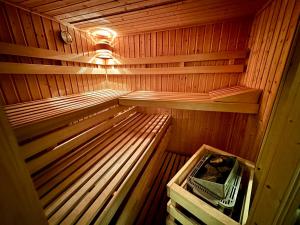 an empty sauna with a light on top of it at Dům u Ševčíků in Volyně