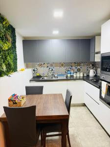 Kuchyň nebo kuchyňský kout v ubytování Ta Cetta