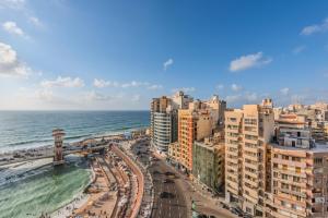 an aerial view of a city and the ocean at Nabeel Homes - Panoramic Seaview Condo in Stanley in Alexandria