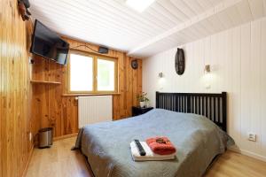 Ένα ή περισσότερα κρεβάτια σε δωμάτιο στο Chambres d'hotes à Autun