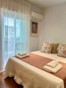 Ένα ή περισσότερα κρεβάτια σε δωμάτιο στο Nueva Córdoba Judería