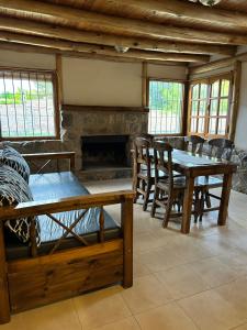 Posezení v ubytování Cabañas del Pasaje + 2 fotografie