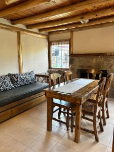 Posezení v ubytování Cabañas del Pasaje