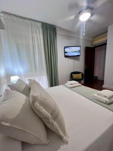 Ένα ή περισσότερα κρεβάτια σε δωμάτιο στο Nueva Córdoba Judería