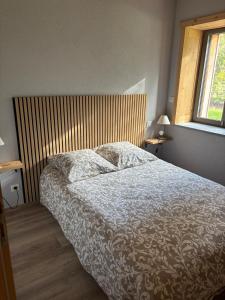 Postel nebo postele na pokoji v ubytování La parenthèse sauvage