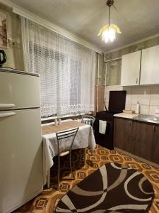 Η κουζίνα ή μικρή κουζίνα στο Апартаменти Клосовського