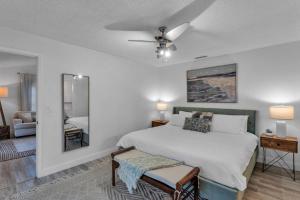 Ένα ή περισσότερα κρεβάτια σε δωμάτιο στο The Paradise Palms +42 φωτογραφίες