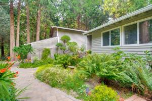 a garden in front of a house at Walk to Beach and Village Bainbridge Island Gem! in Lynwood Center