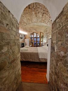 Postel nebo postele na pokoji v ubytování AM17 - The ancient cave + 15 fotografií