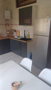 Kuchyň nebo kuchyňský kout v ubytování Luxury apartment 100 m2 in Mohammedia + 6 fotografií