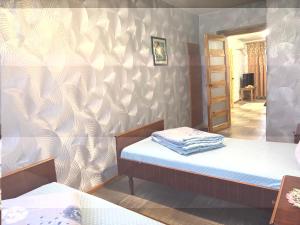 Ένα ή περισσότερα κρεβάτια σε δωμάτιο στο Сдам 2-х комнатную квартиру