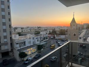 a view of a city with cars on a street at Le Relais Résistance Luxury in Sousse