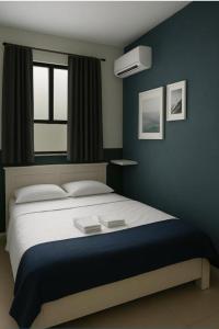 Ένα ή περισσότερα κρεβάτια σε δωμάτιο στο Your home stay