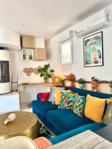 Posezení v ubytování Résidence belle créole I Le Balisier I Duplex avec jacuzzi à 15min de Disneyland Paris