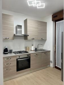 Kuchyň nebo kuchyňský kout v ubytování DD apartment + 3 fotografie