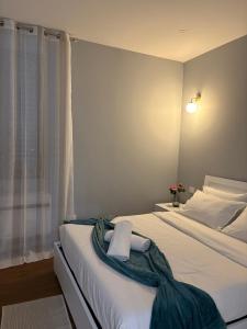 a bedroom with two beds and a window at AB apartment Pistoia in Pistoia