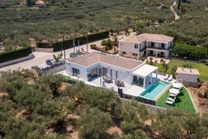 an aerial view of a house with a swimming pool at Villa Marco in Zakynthos Town