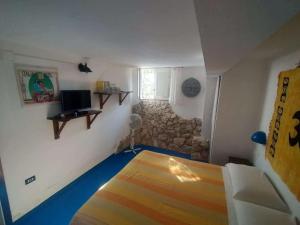 Μια τηλεόραση ή/και κέντρο ψυχαγωγίας στο Appartamenti Jeko