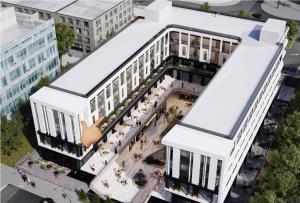 an overhead view of a building with a courtyard at القوميه 