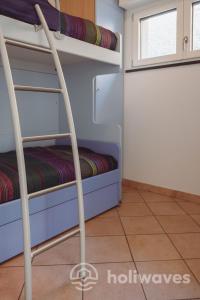 Ένα ή περισσότερα κρεβάτια σε δωμάτιο στο La casa di Maurizio