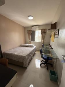 En eller flere senge i et værelse på COP30 - Apartamento completo para alugar + 8 billeder