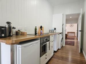 Kuchyň nebo kuchyňský kout v ubytování Kernow - Minimum age 18