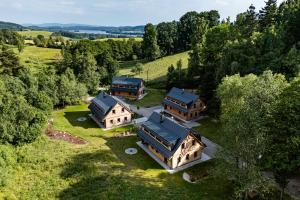 an aerial view of a house in a field at Vila Sněženka in Horní Planá