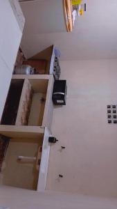 Una televisión o centro de entretenimiento en Quarto de temporada