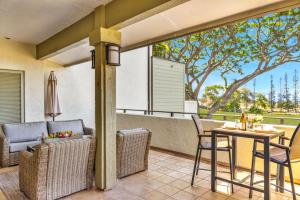an outdoor patio with a table and chairs at NEW KBM Resorts FREE CAR Kapalua Golf Villas 1-Bedroom Condo with Spacious Lanai and Golf Course Views KGV-18T4 in Kapalua