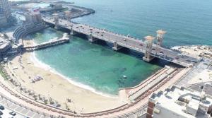 an aerial view of a bridge over a beach at Nabeel Homes - Panoramic Seaview Condo in Stanley in Alexandria
