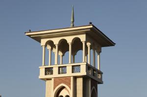 a clock tower with a blue sky in the background at Nabeel Homes - Panoramic Seaview Condo in Stanley in Alexandria