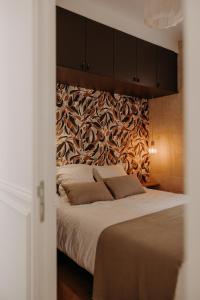 Postel nebo postele na pokoji v ubytování Le Nid du Château - Cocon avec Bagagerie