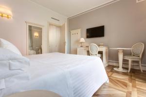 Телевизор и/или развлекательный центр в Hotel Cenobio Dei Dogi