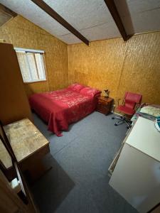 Voodi või voodid majutusasutuse Cabaña en Frutillar, 2 dormitorios para 4 personas toas