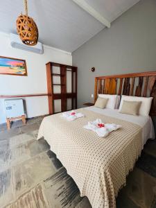 Ένα ή περισσότερα κρεβάτια σε δωμάτιο στο Hotel Fazenda Alta Vista