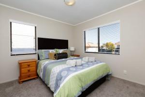 Ένα ή περισσότερα κρεβάτια σε δωμάτιο στο Ocean Beach Getaway