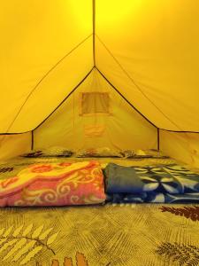 Postel nebo postele na pokoji v ubytování River - Paradise Camps
