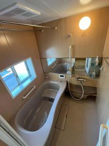 Koupelna v ubytování Kuzakura