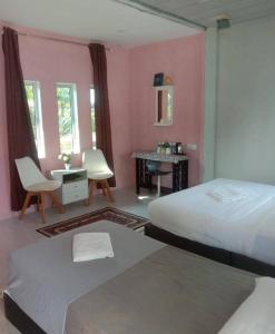 Postel nebo postele na pokoji v ubytování Mersing Barokahhill Beach Resort + 31 fotografií