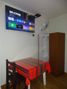 Stolní tenis v ubytování Hospedaje Dimar Inn nebo okolí