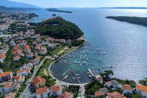an aerial view of a harbor with boats in the water at Apartments with parking space Palit, Rab - 14610 in Rab